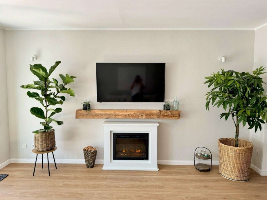 Wohnzimmer mit Elektrokamin Haus Bremen